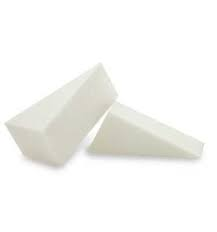 two white wedge shape makeup sponges